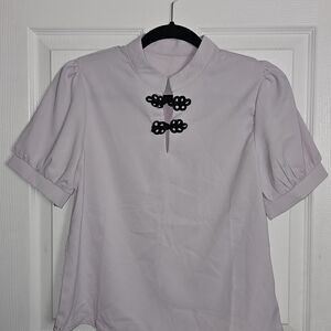 Elegant Women's Top with Black Accents